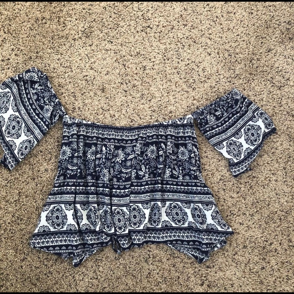 flowy shirt off the shoulder,laces up in the back